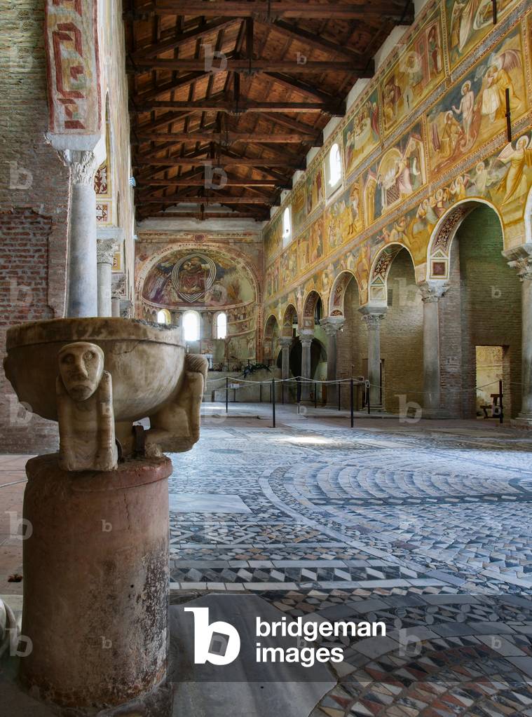 View of the interior, the opus sectile floor and the baptismal font of the Basilica of Santa Maria, Pomposa Abbey, Codigoro, Ferrara, Emilia Romagna, Italy (photo)