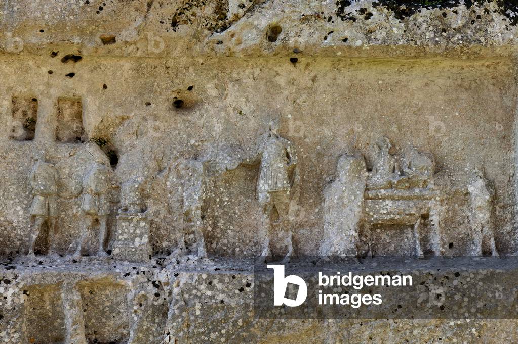 Detail of a bas relief in the latomie, Palazzolo Acreide, The archaeological site of Akrai, Sicily, Italy (photo)