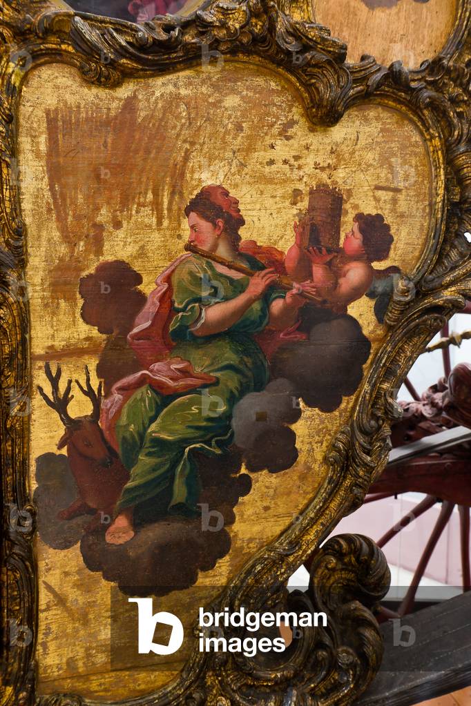 Golden Carriage, detail of the decoration with a female figure and a putto