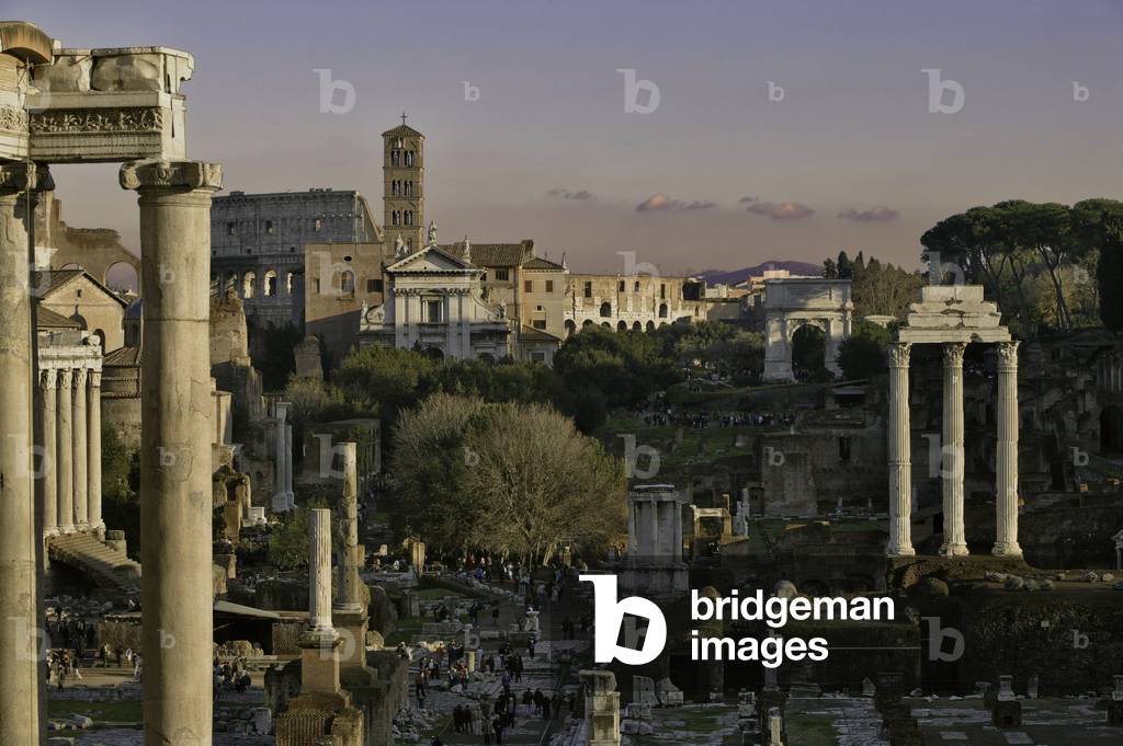The Columns of the temple of Saturn, the three columns of Temple of Dioskouri, the Church of Santa Francesca Romana and the Colosseum, Rome, Italy (photo)