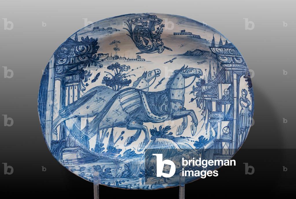 Plate decorated with racing horses and a coat of arms, first half of the 18th century (majolica)