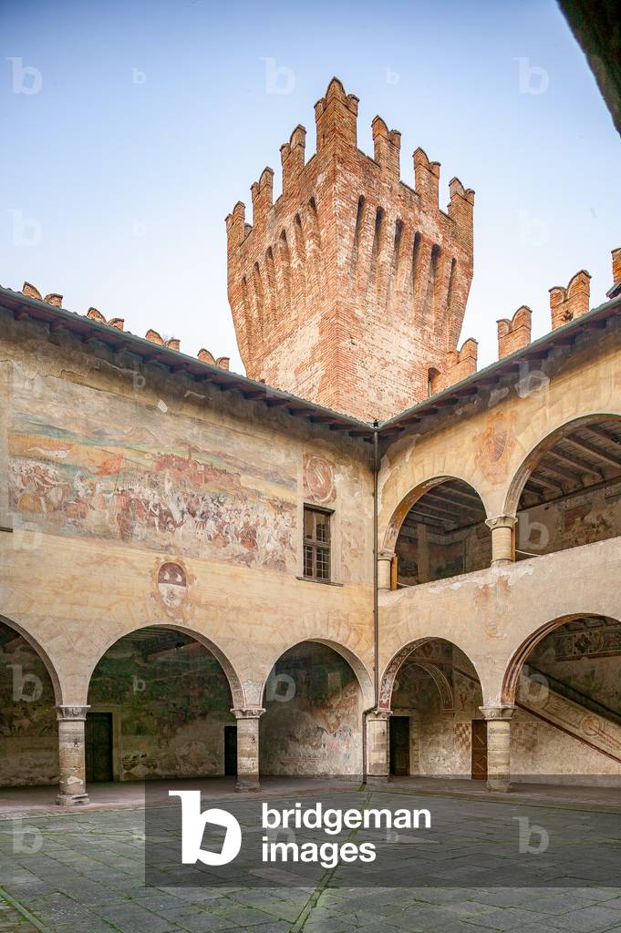 Courtyard and the fresco depicting the Battle of Riccardina by Romanino, Malpaga Castle, Cavernago, Bergamo, Italy (photo)
