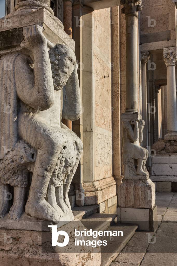 Telamon of the left portal, Cathedral of Piacenza, Piacenza, Emilia-Romagna, Italy (photo)