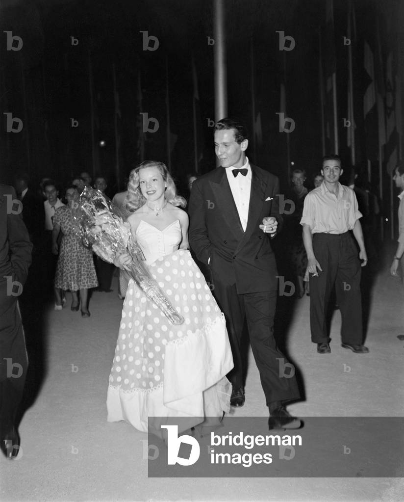 THE ACTRESS CECILE AUBRY WITH THE ACTOR ALBERTO DAL SACCO AT THE X INTERNATIONAL FILM FESTIVAL IN VENICE LIDO - 1949