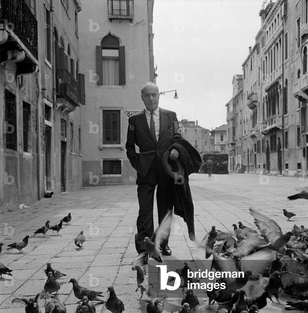 THE ACTOR CHARLES BOYER IN VENICE (surrounded by pigeons) - 1970 approx.