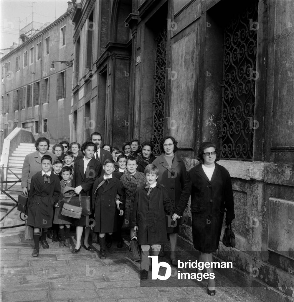 When students leave school in Venice, they wear a blouse.