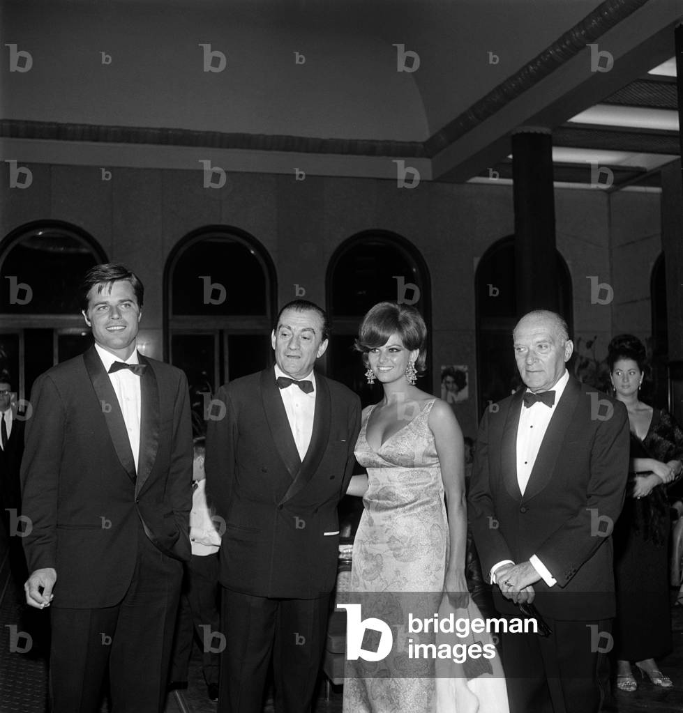 THE ACTRESS CLAUDIA CARDINALE WITH THE DIRECTOR LUCHINO VISCONTI AND THE ACTORS JEAN SOREL AND RENZO RICCI AT THE INTERNATIONAL FILM FESTIVAL IN VENICE LIDO - 1965