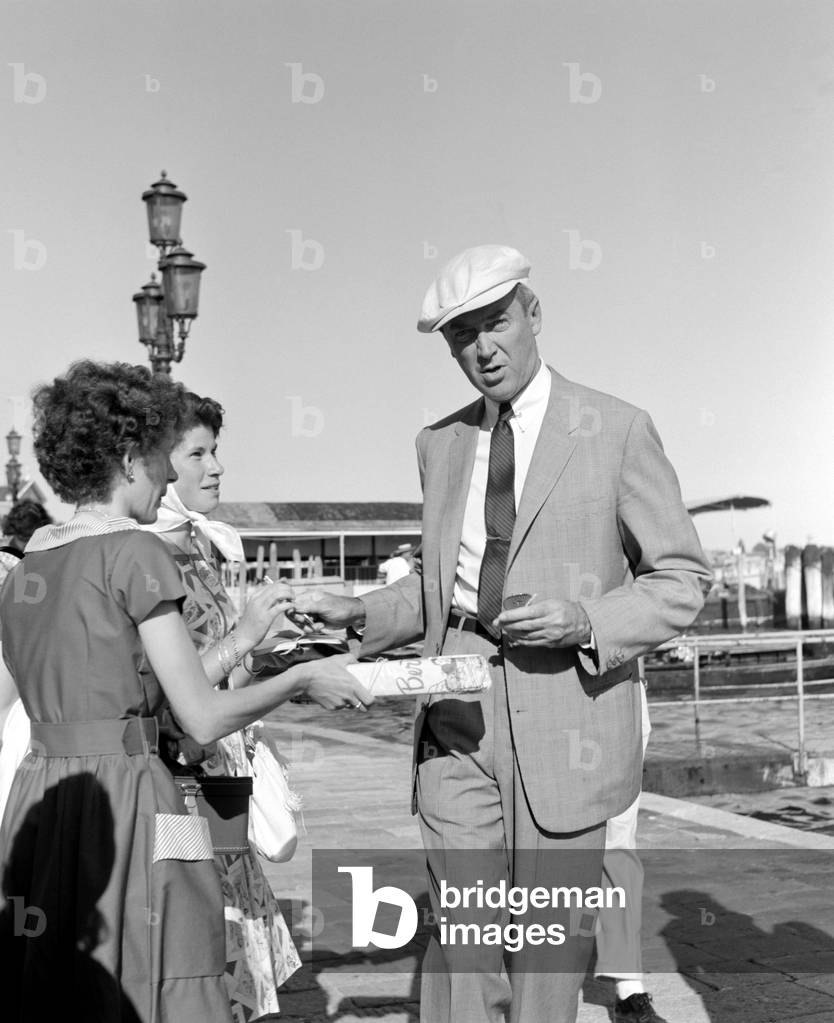 THE ACTOR JAMES STEWART IN VENICE (they sign autographs to fans) - 1960