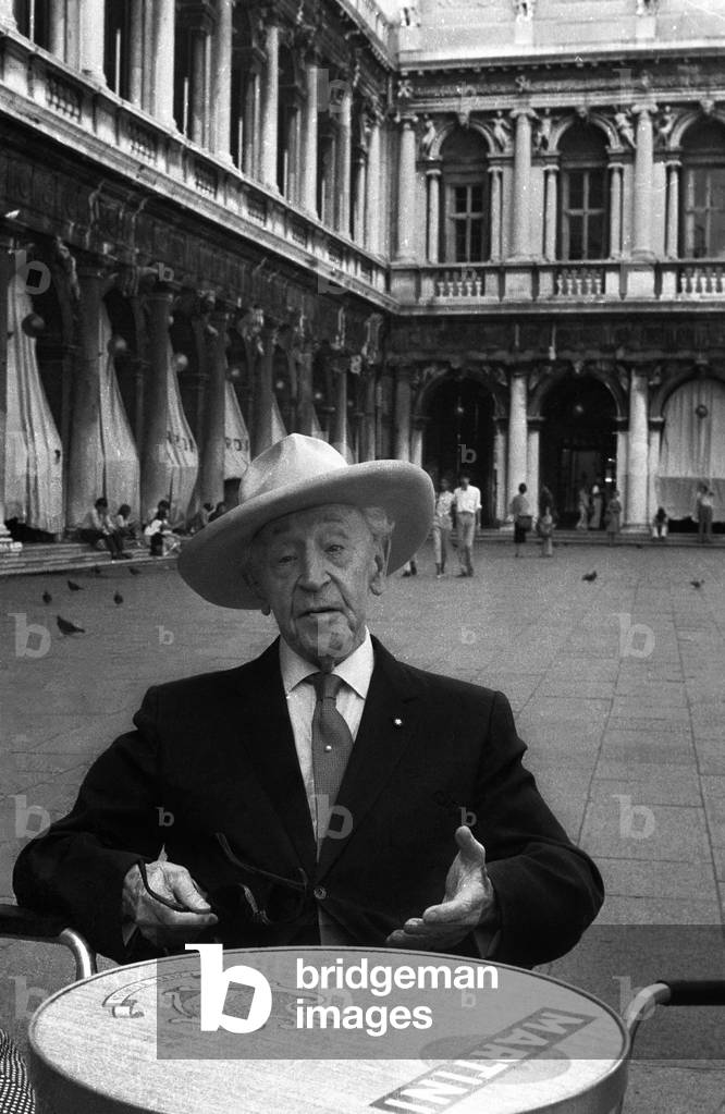 Pianist ARTHUR RUBINSTEIN seated on a bar terrace on St. Mark's Square in Venice in 1979