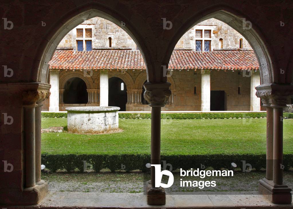 France, Gers, department 32, Cistercian Abbey of Flaran, located in Valence-sur-Baise, Romanesque church founded in 1151, historical monument class, Gothic cloister of the 14th century with capitals with foliage and mask