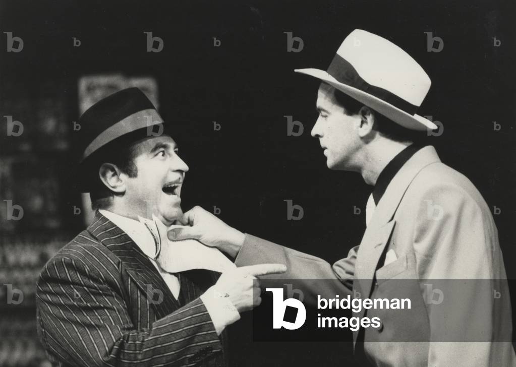 Bob Hoskins as Nathan Detroit and Ian Charleson as Sky Masterson in 'Guys and Dolls' at the National Theatre, 1982 (b/w photo)