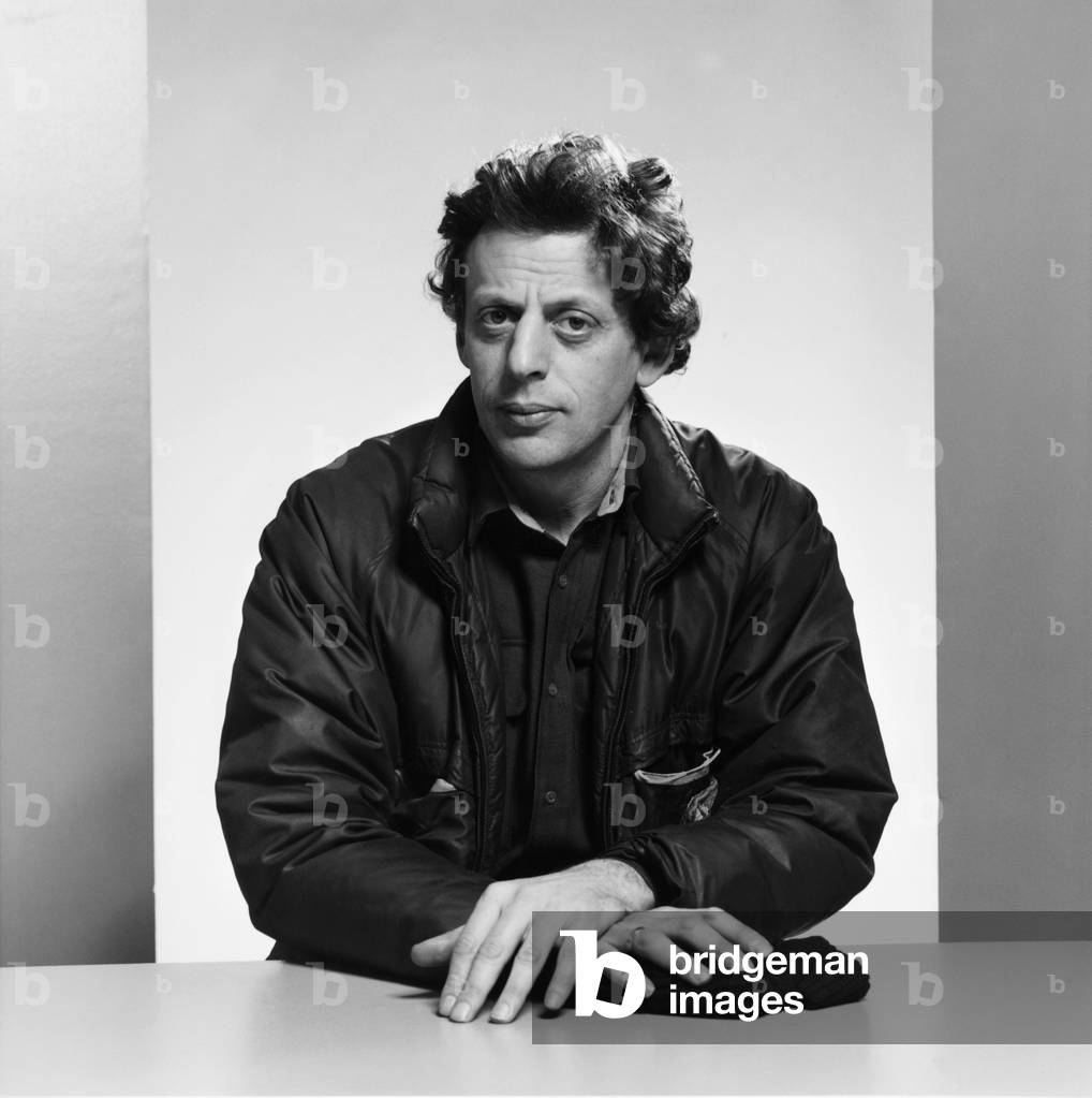 Philip Glass seated portrait