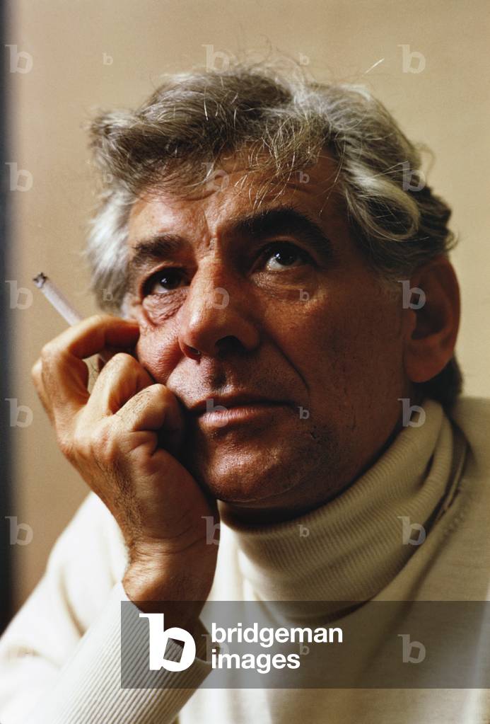Leonard Bernstein closeup holding