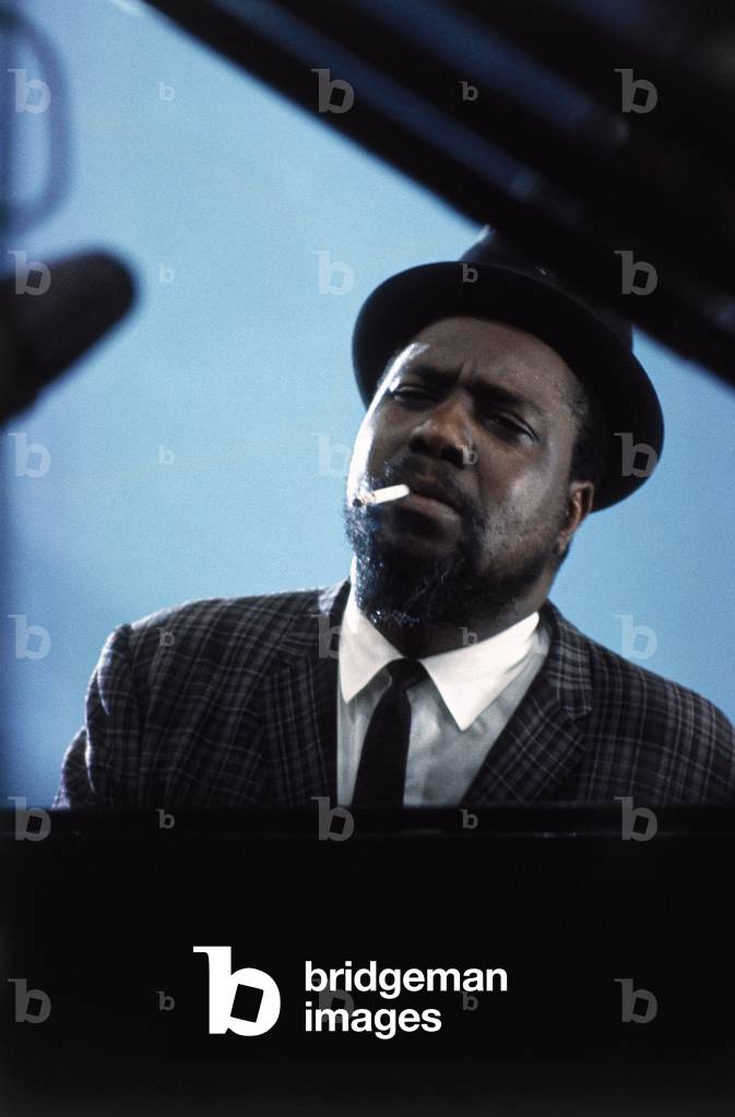 Thelonious Monk seated at