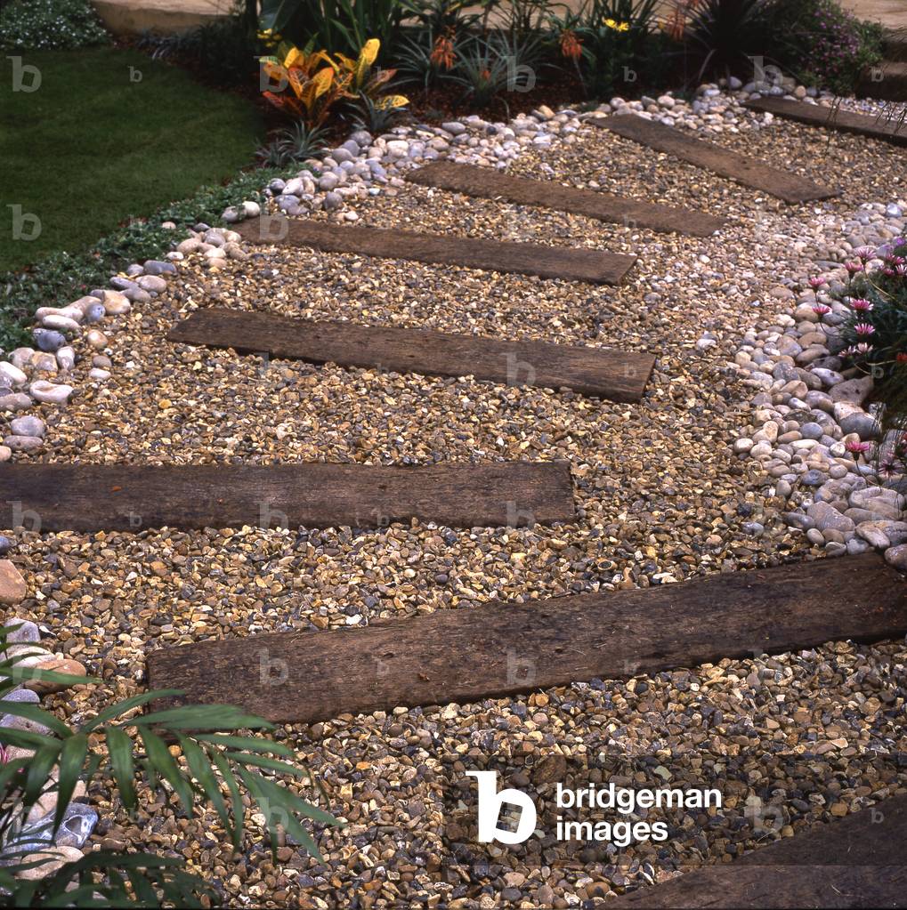 Gravel, wooden sleepers and pebbles