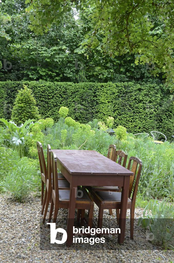 Wooden garden furniture/Euphorbe/Mont des Recollets farm gardens/Mont des Recollets farm gardens/Cassel/North/Nord Pas de Calais/France