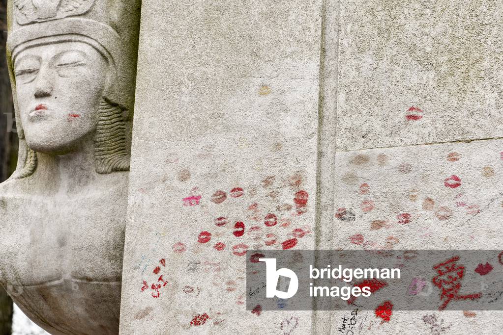 Red Lip on the Tomb of Oscar Wilde, Pere Lachaise cemetery, Paris (photo)