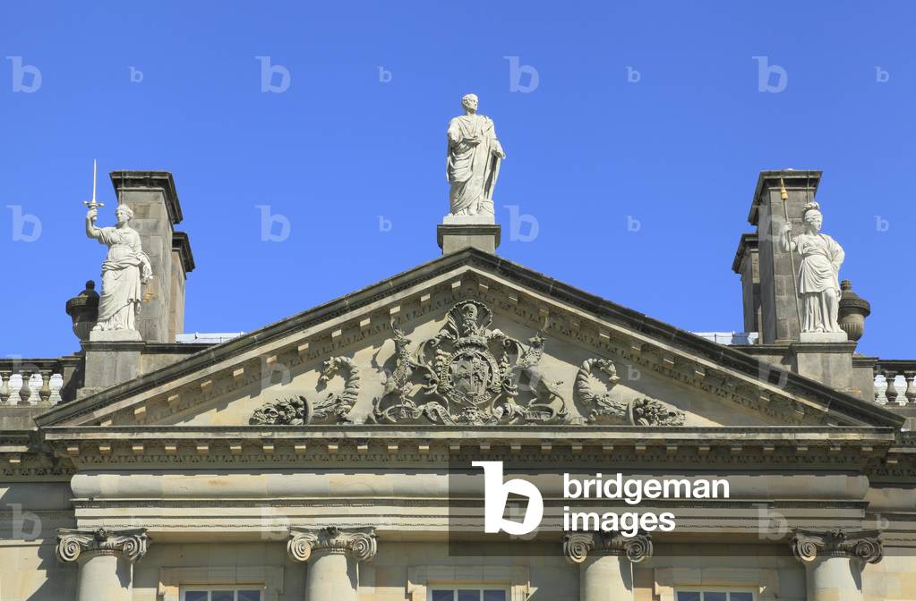 Detail of pediment with coat of arms and statuary, Houghton Hall, Norfolk (photo)