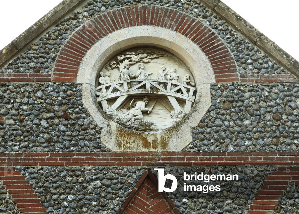 Memorial on Hoxne village hall depicting King Edmund hiding under Goldbrooke Bridge, Suffolk (photo)
