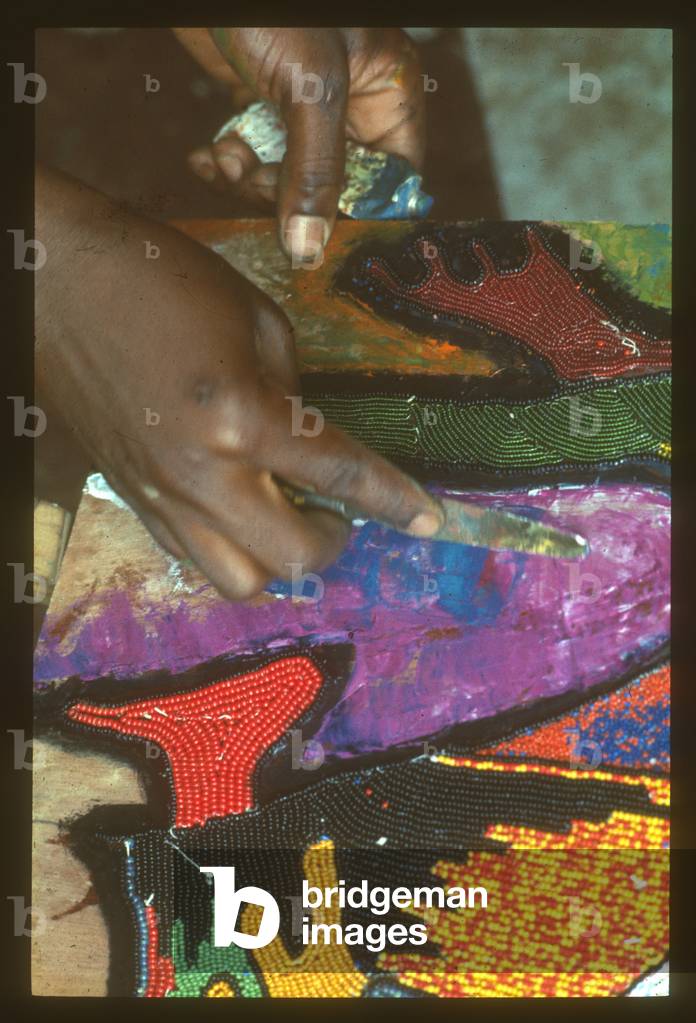 Artist Jimoh Buramoh working