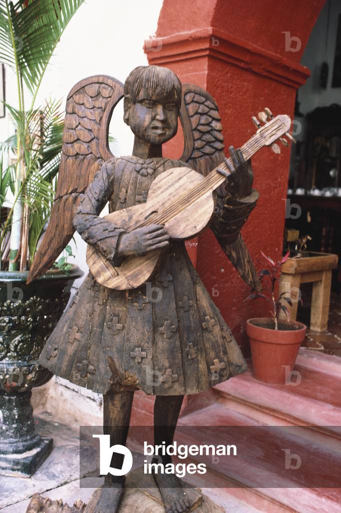 Wooden sculpture of angel