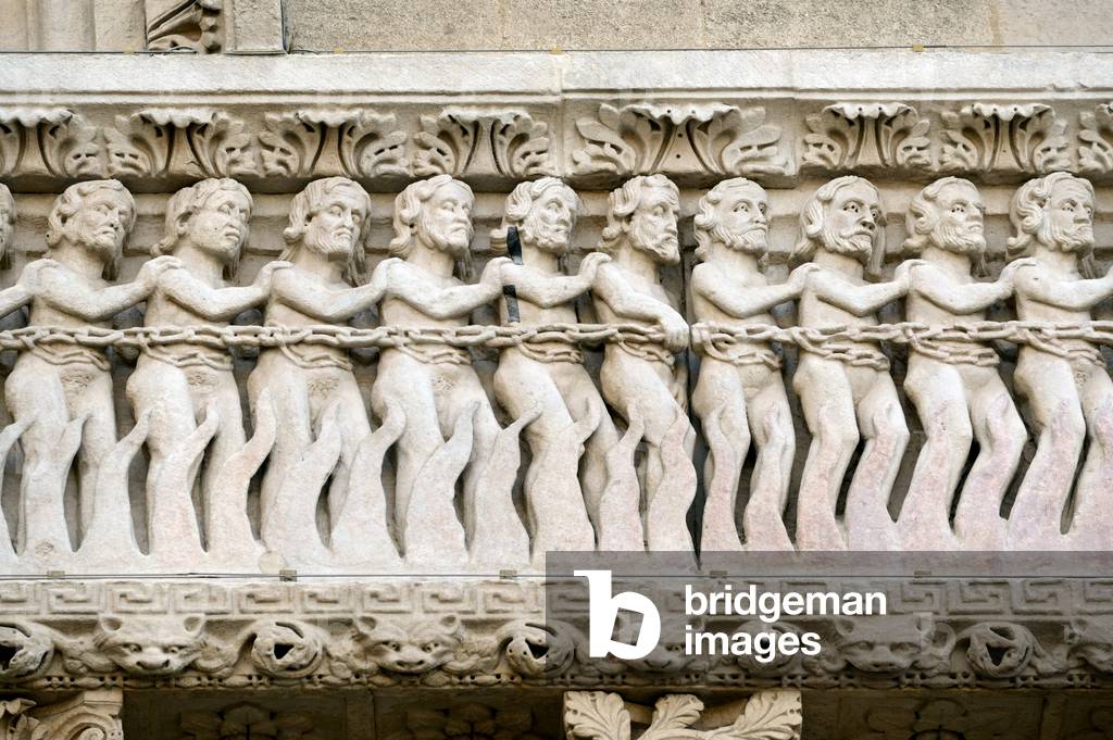 Bas-Relief Romanesque Sculpture of Chained Sinners in Procession on Way to Hell on Façade of the Church of Saint Trophime Arles France, 11th-12th century (Romanesque Sculpture)