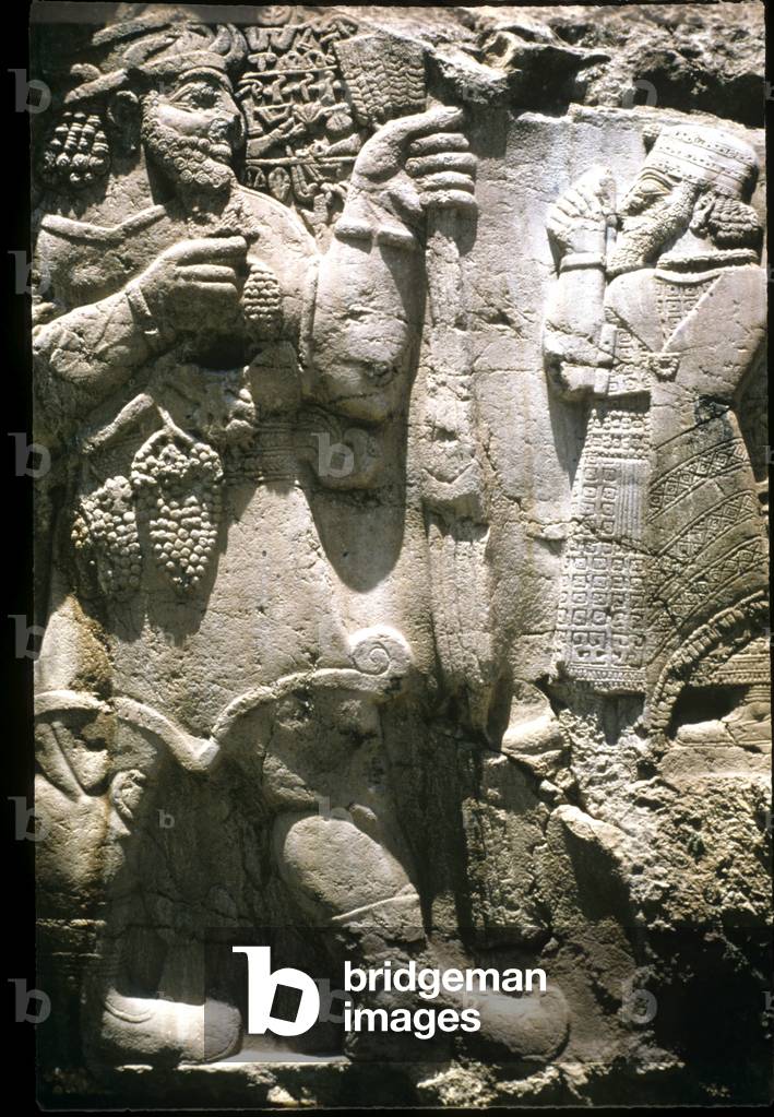 Hittite God, Tarhu (L) and King Warpalawas, 8th century BC. Ivriz. Turkey