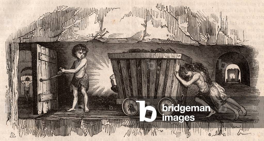 Two children pushing a trolley in an English coal mine, a third, the 