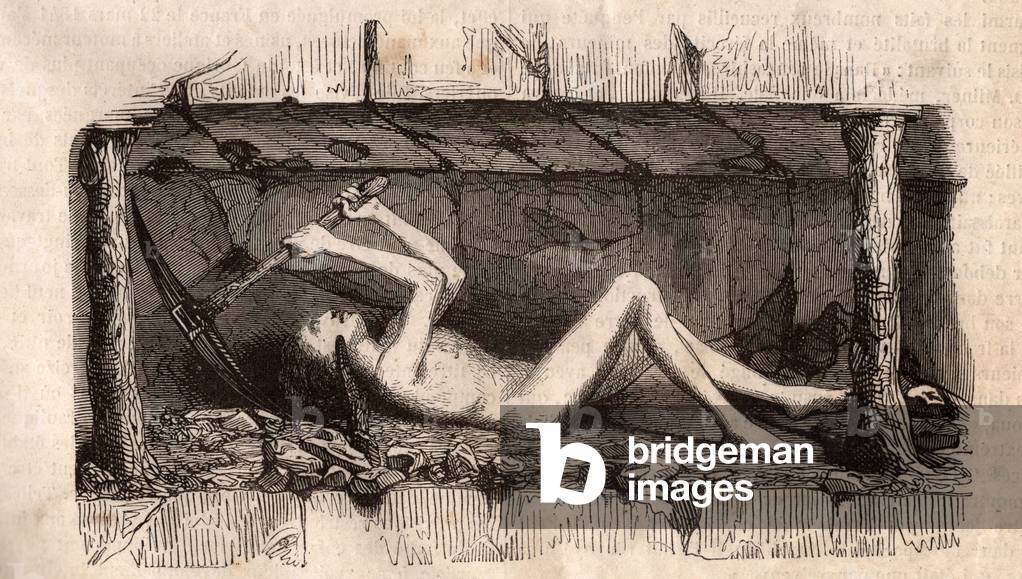 A young man, lying to the ground and picking the ceiling of tunnel in an English coal mine (emgraving)