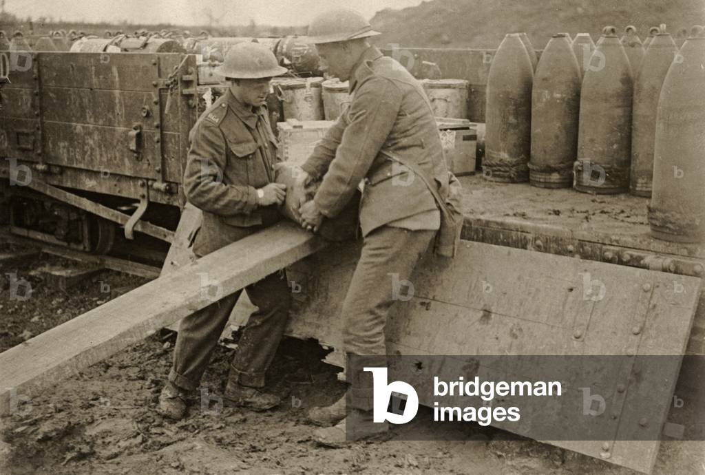 British soldiers unloading heavy shells, Wesern Front, 1914-18 (b/w photo)