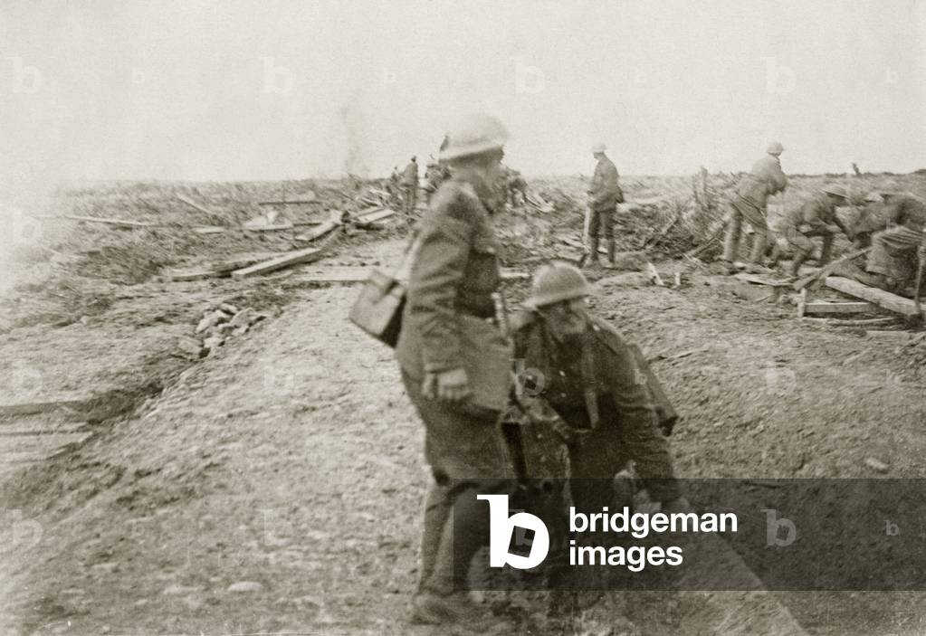 British soldiers repairing a road under fire near Ypres, 1914-18 (b/w photo)