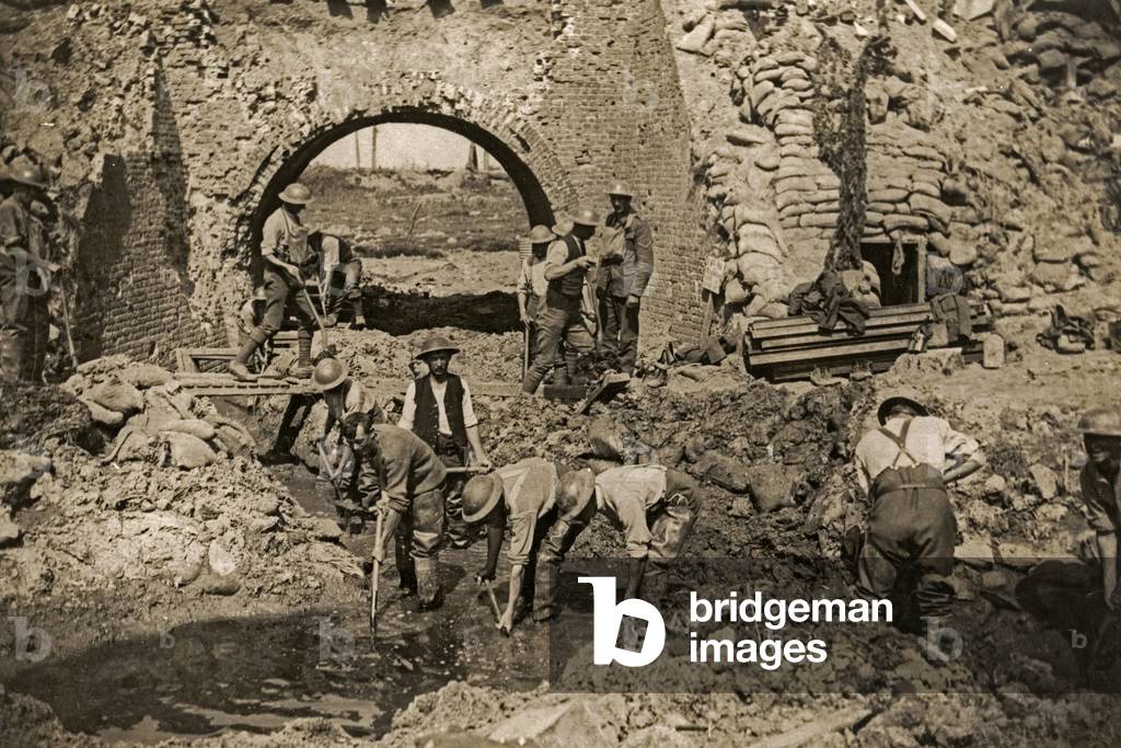 British soldiers draining captured ground, Flanders, 1914-18 (b/w photo)