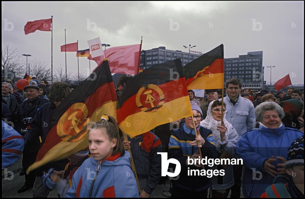 Participants in a Party of Democratic Socialism campaign rally, 10th March 1990 (b/w photo)
