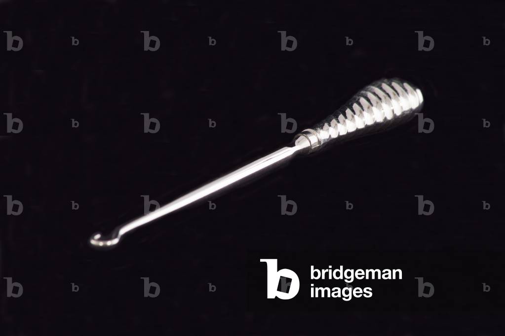 Royal Irish Constabulary button hook, c.1908-12 (white metal)