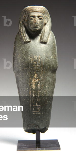 Ushabti figure for the priest Ra-s-hetep-ib, Middle Kingdom, c.1950 BC (greywacke)