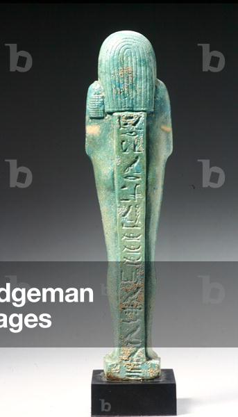 Rear view of an Ushabti figure for Nakht-Hor-em-heb-mes-em-khereden, Late Dynastic Period, c.600 BC (faience) (see 241439 for front)