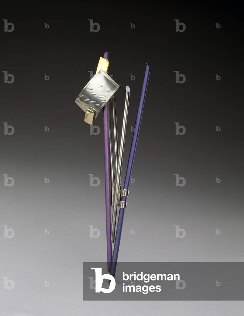 Brooch, c.1981-82 (titanium, gilt, & sterling silver)