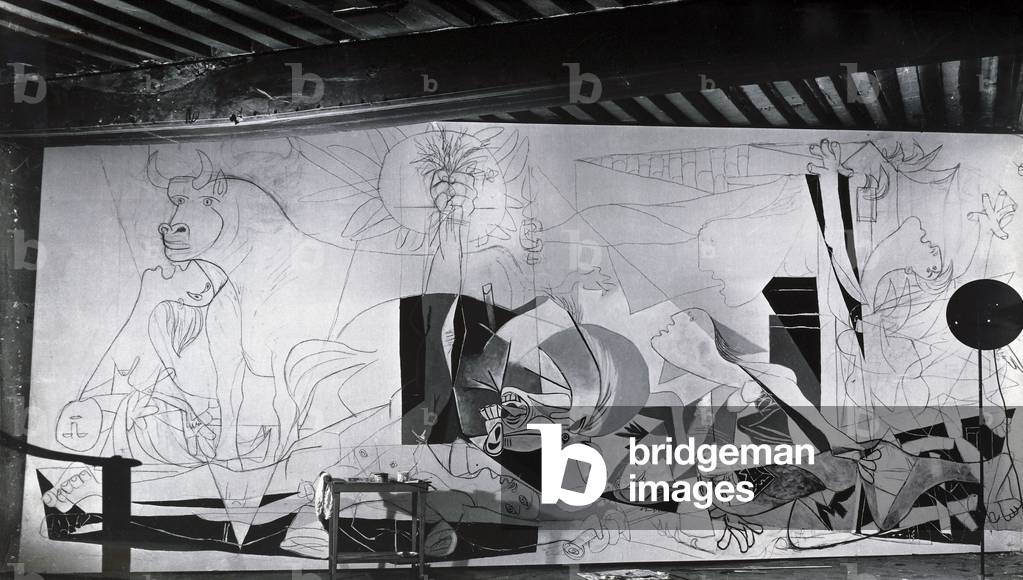 View of the painting 'Guernica' in Picasso's studio, Paris, 1937 (b/w photo)