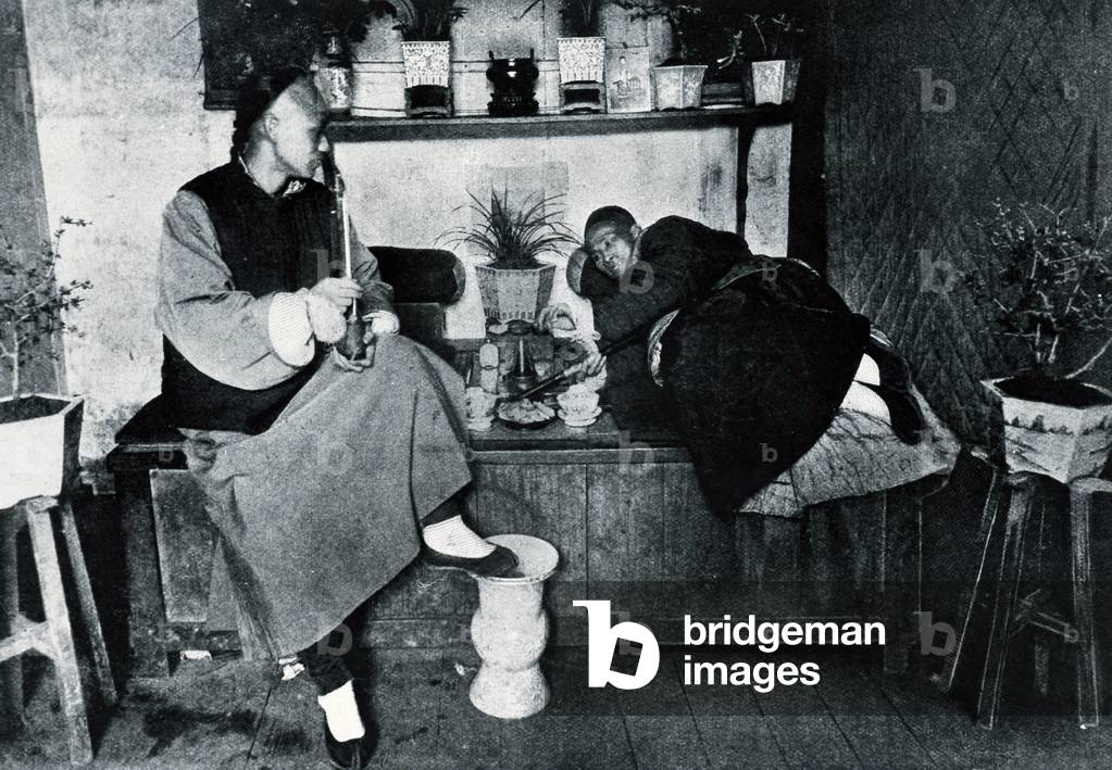 Drugs: opium smokers in China, 1900 (b/w photo)