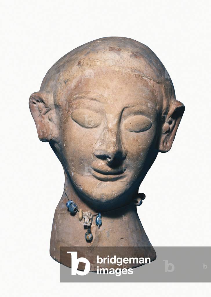 Punic art: woman's head,  sculpture from Puig des Molins (Ibiza) (terracotta)