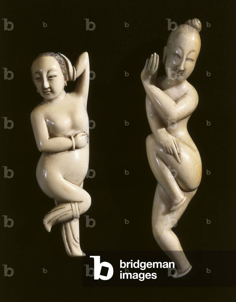 Female figurines used to indicate the point of pain in China (ivory)