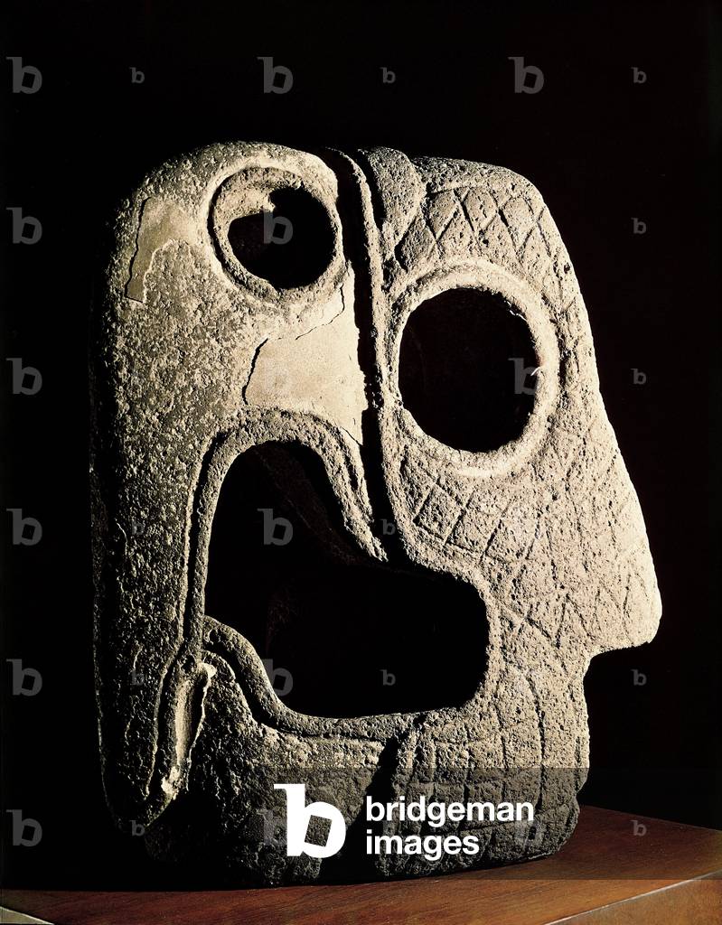 Precolombian civilization: Aztec ball playground marker. Sculpture in the shape of a head of Araw. From Xochicalco, Morelos. Dim. 56 cm Mexico Museo Nacional de Antropologia