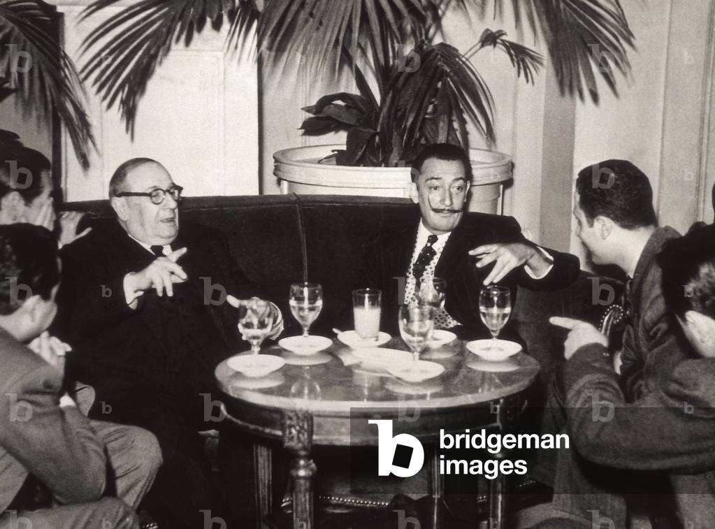 Salvador Dali (1904-1989) and Mr Balana with other journalists from Barcelona trying to organize a surrealist bull fight on April 11, 1953 (b/w photo)