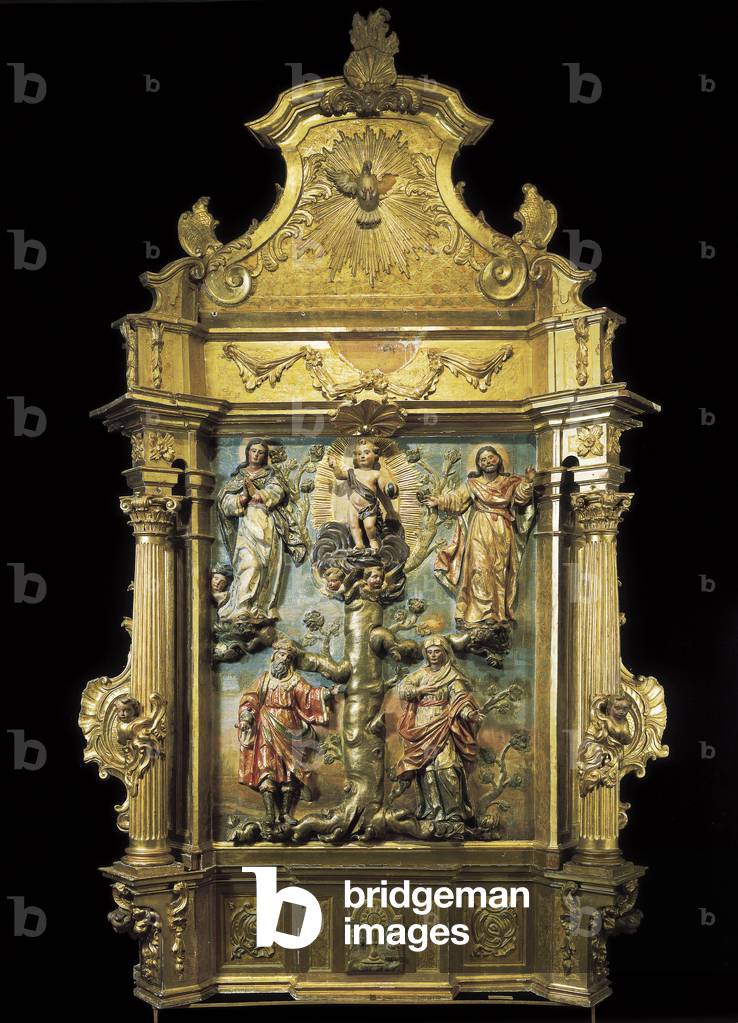 Baroque art: altarpiece of the genealogy of Christ. The Jesus child at the top of the tree of his ascendants Mary and Joseph. Polychrome wood by Pedro de Sierra (1702-1760) 18th century.