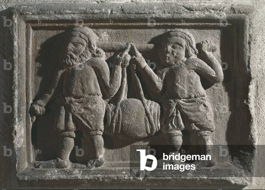 Relief depicting bootmakers (stone)