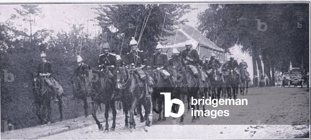 Troop of French lancers passing through a Belgian village, from The Great War The Amalgamated Press Limited, 1914 (colour litho)