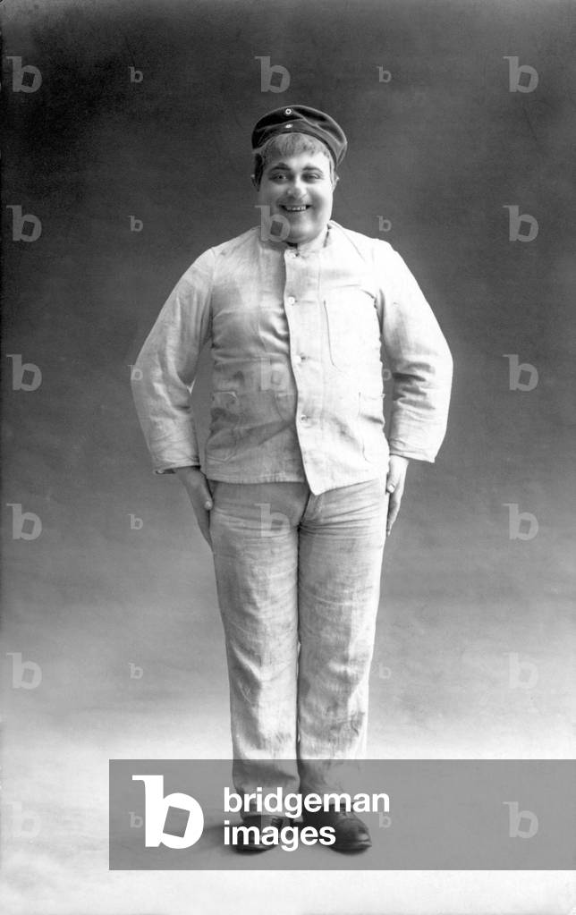 Portrait of a corpulent smiling man. Photograph about 1912
