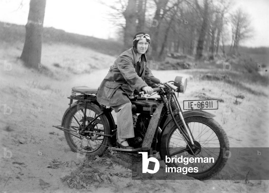Woman on a motorcycle. Photography around 1922
