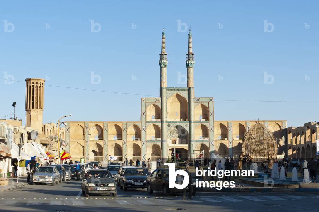 Tekiyeh Amir Chaqmaq Square and former mosque with twin minarets; Yazd; Iran; Asia