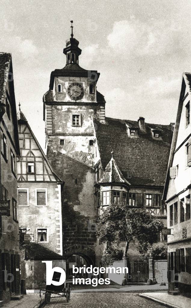 Rothenburg ob der Tauber near the Tauber River in Germany (La Tur Blanche or Weisser Turm). Postcard around 1938.